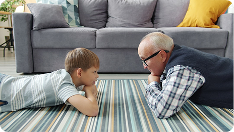 Grandfather and grandson having a conversation